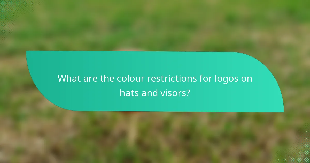 What are the colour restrictions for logos on hats and visors?